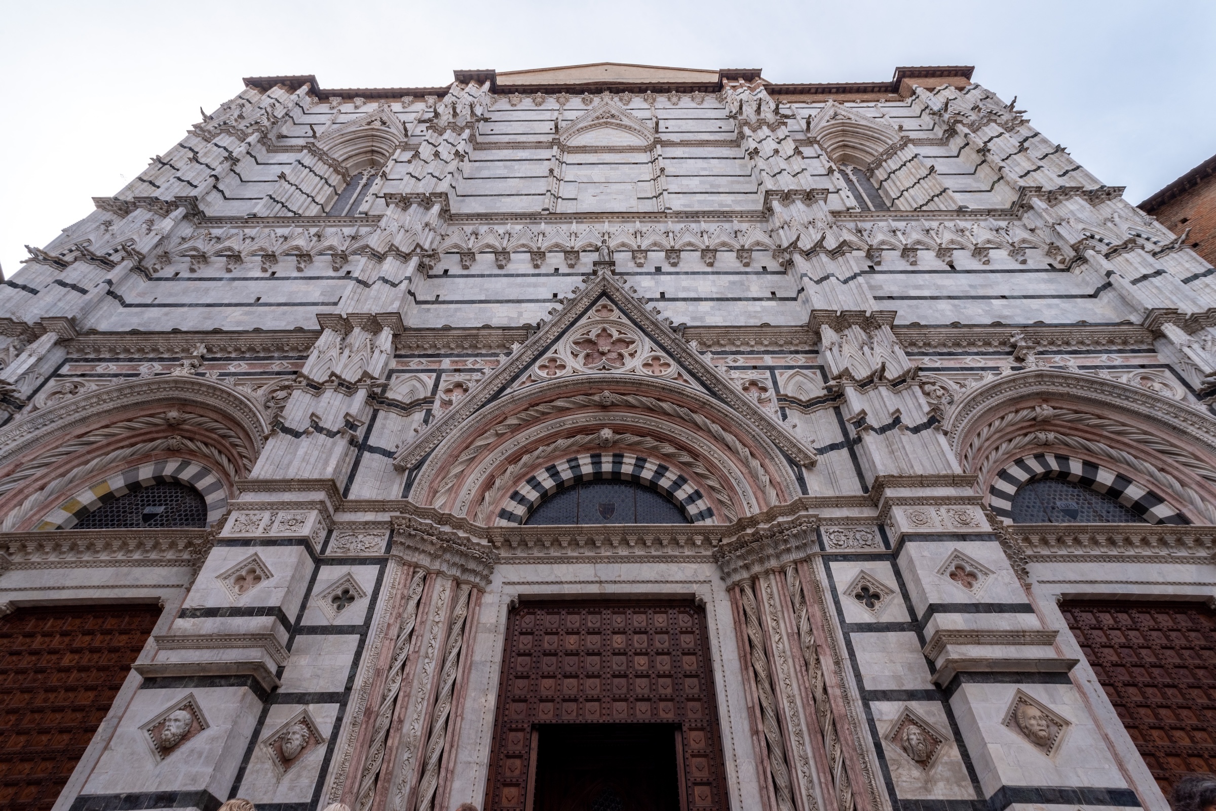 Baptistery of San Giovanni with baptismal font by Donatello